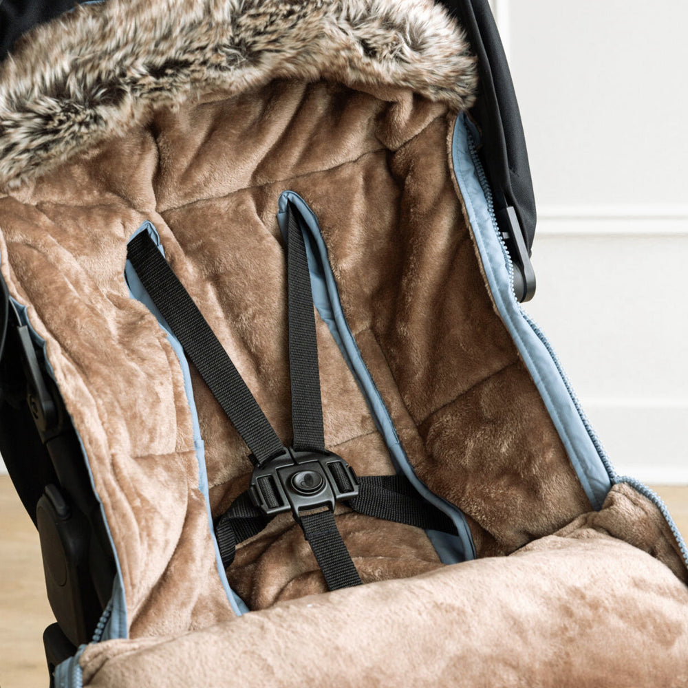 Intérieur de la housse chancelière Petit Coulou avec harnais de sécurité