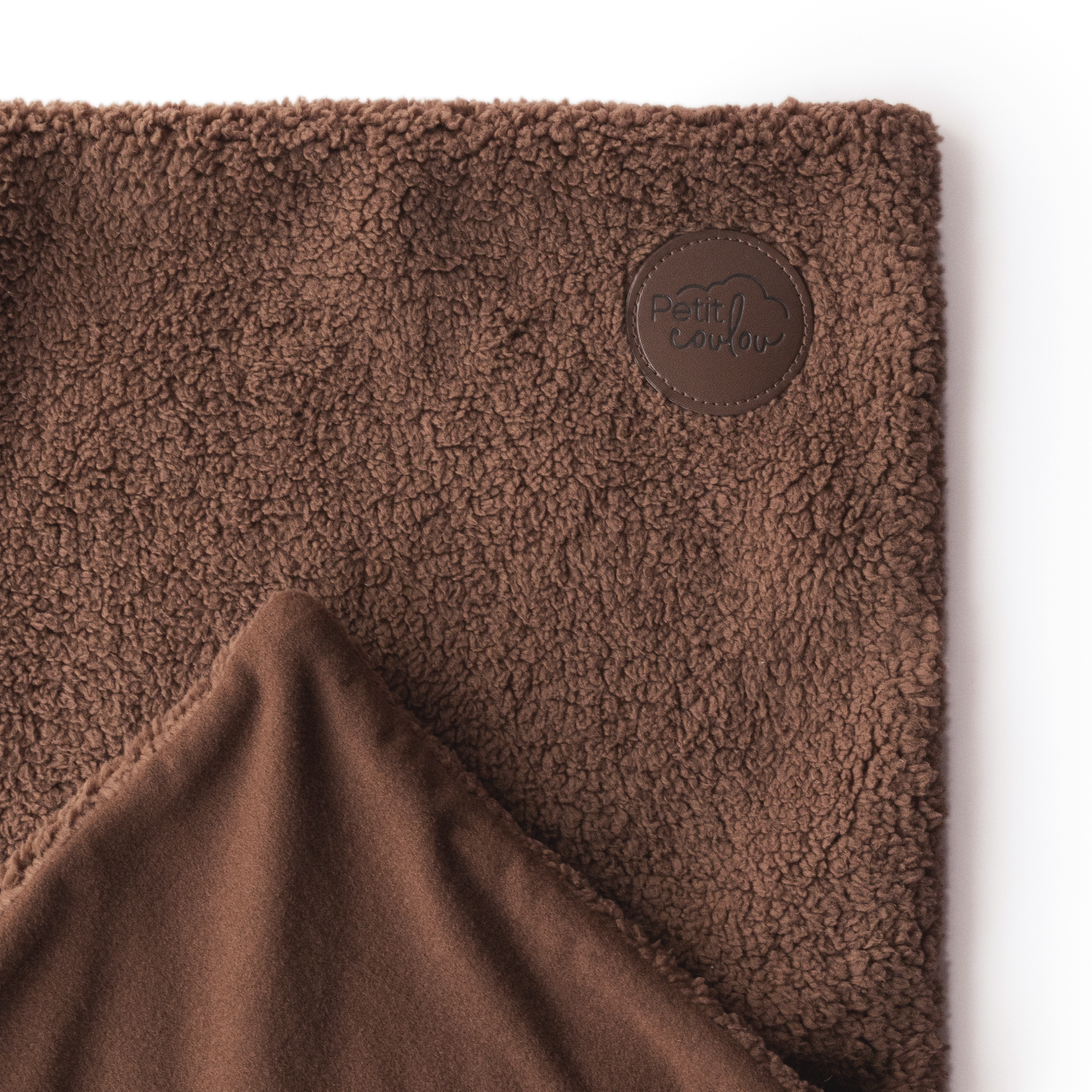 Doudou pour siège d'auto bébé en Sherpa
